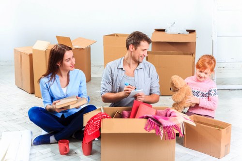 Professional removals in Preston with moving van and packed boxes