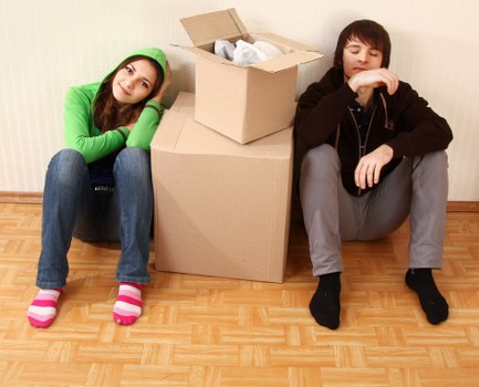 People organizing belongings in Preston storage space