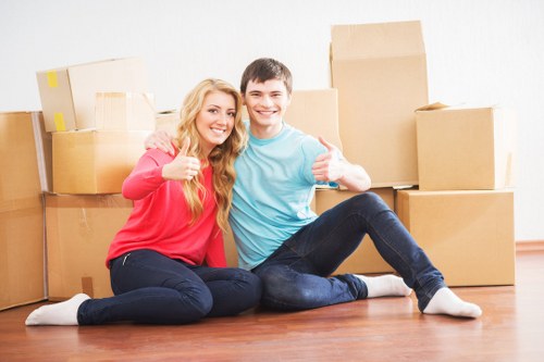 Moving day preparation with labelled boxes and packing materials in Preston